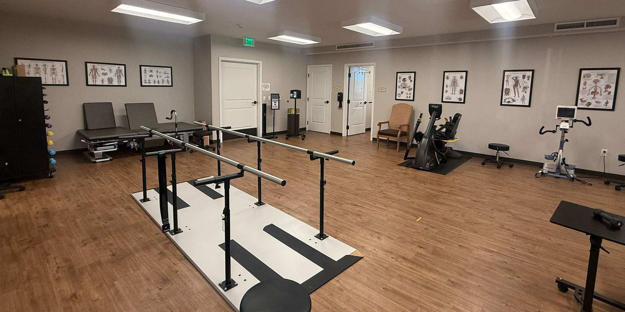 The Orchards rehabilitation center focusing on a the parallel bars used to help reinforce balance in walking.